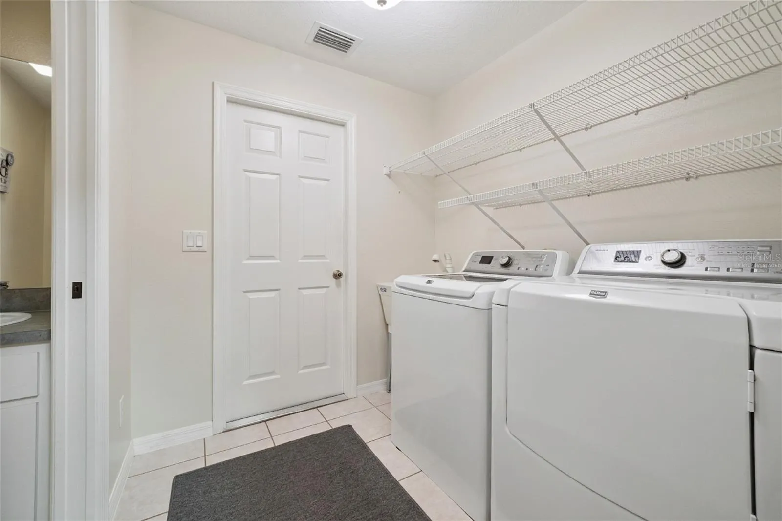 Virtually Staged/Decluttered Laundry Room