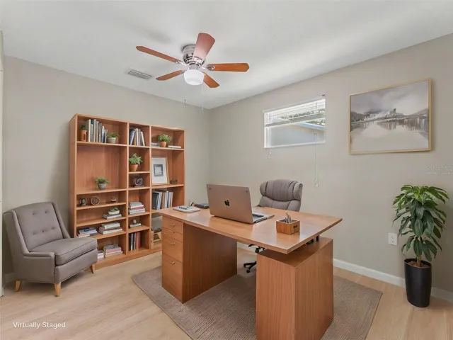 Virtually staged as an office Bedroom #3