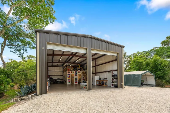 Expansive Utility Barn with Oversized Access Bays