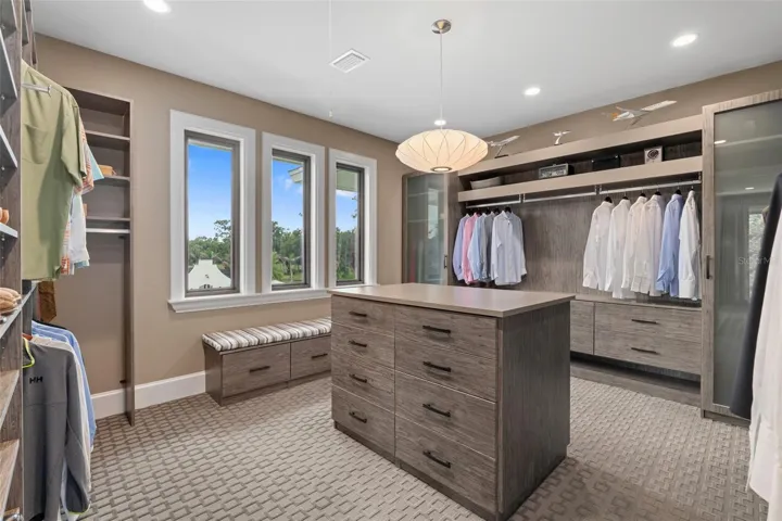 Boutique-Inspired East Wing Dressing Room with Central Island