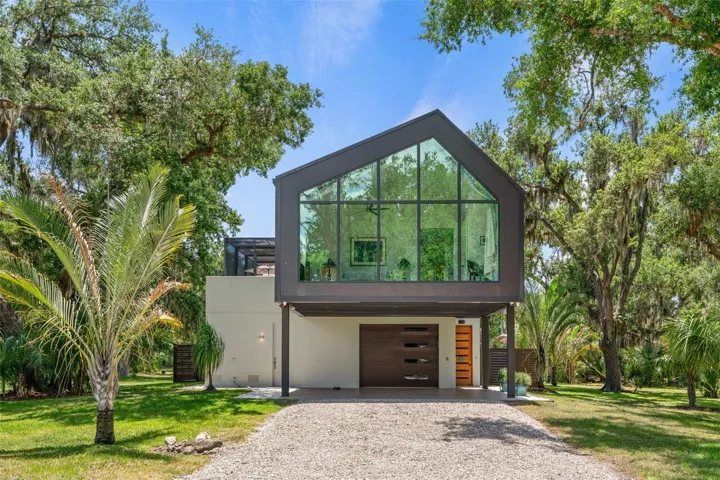 Architecturally Distinct Guest House with Elevated A-Frame Design