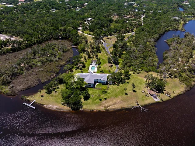 Full Peninsula Estate Surrounded by Water & Protected Preserve
