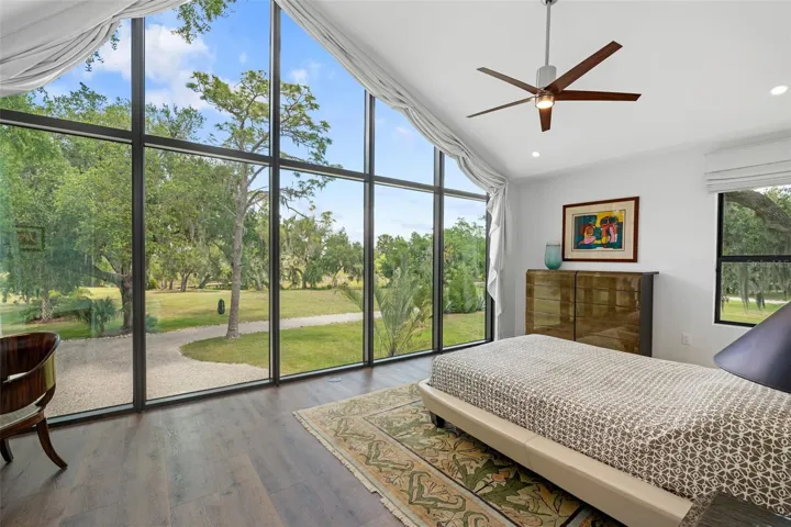 Guest House Bedroom Suite Wrapped in Floor-to-Ceiling Glass