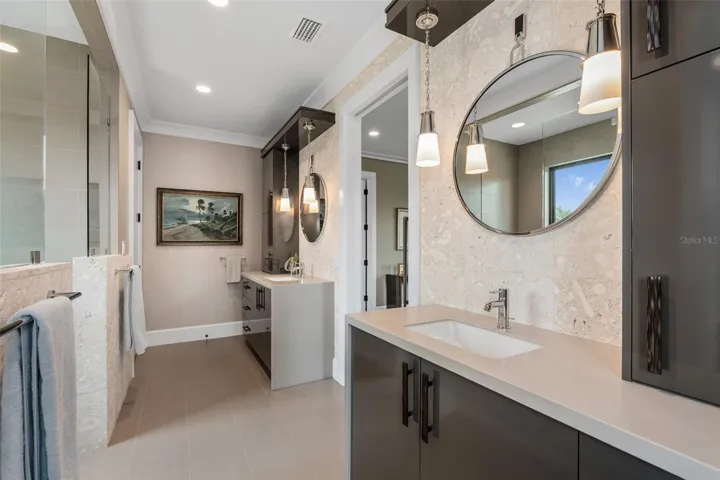 Designer East Wing Bath with Smart Fixtures & Stone Finishes