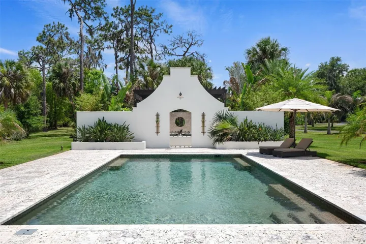 Striking Modern Coastal Architecture Framed by Tropical Landscaping