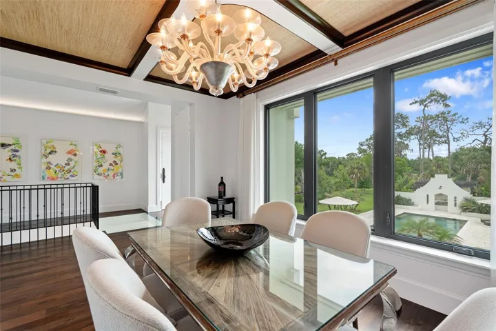 Formal Dining Room with Poolside Garden Views
