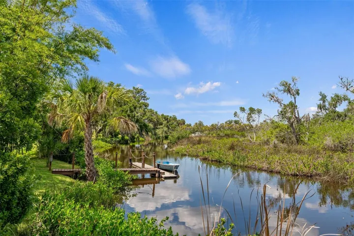 Private Lagoon Framed by Native Landscape & Wildlife Habitat