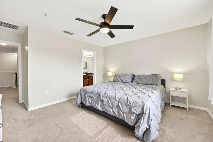 Spacious primary suite will quickly become your tranquil retreat.