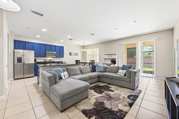 Open living, dining and kitchen.