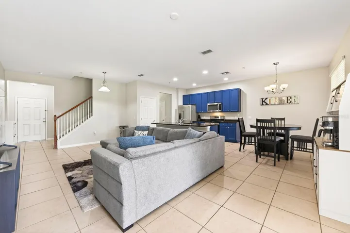 Open living, dining and kitchen.