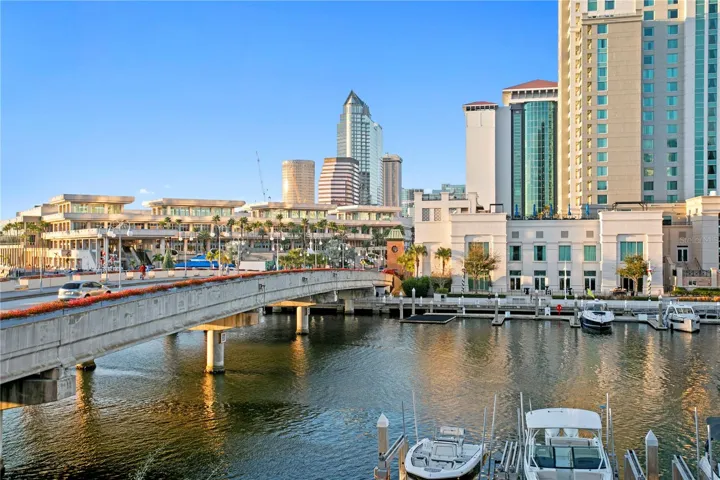 Sweeping views of the water, downtown skyline, and vibrant Water Street.