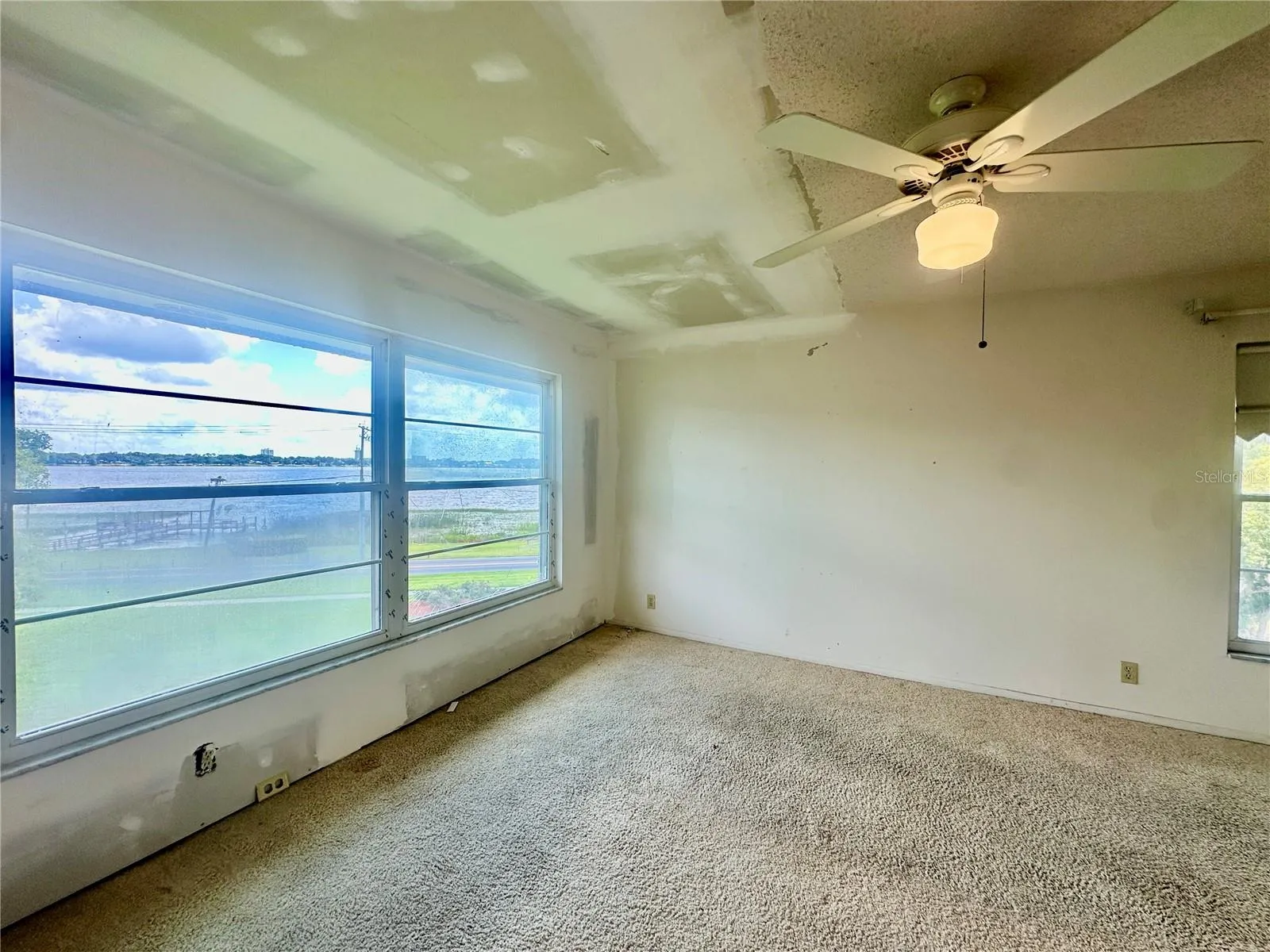 Primary Bedroom with view of Lake Howard