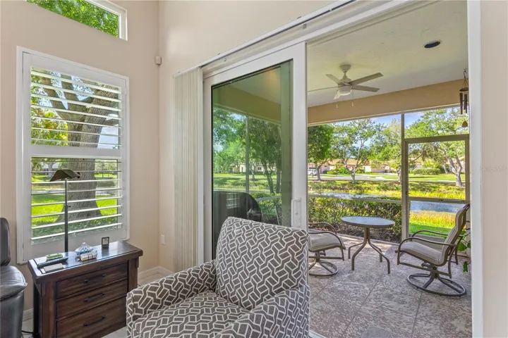 Enjoy peaceful lake views from the spacious screened lanai
