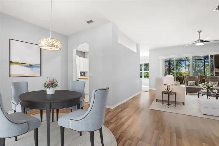 Virtually Staged - Dining Room and Living Room with Kitchen Access