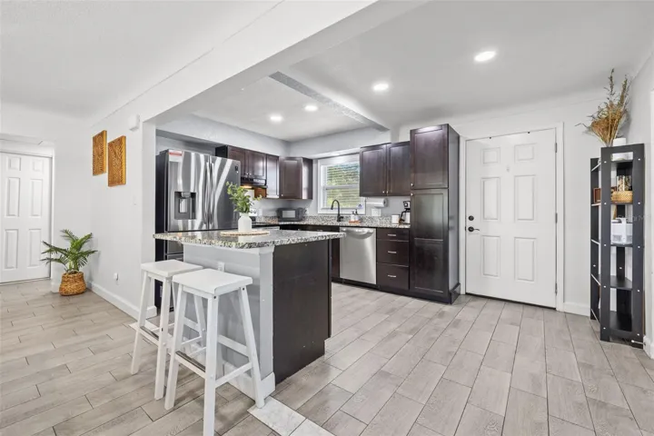 Updated Kitchen & Wood Look Tile Throuhout!