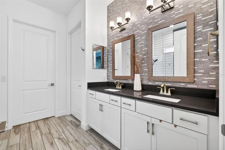 Primary bathroom suite with double vanity