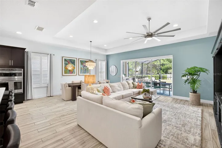 Light and bright open floor plan living, dining, and kitchen