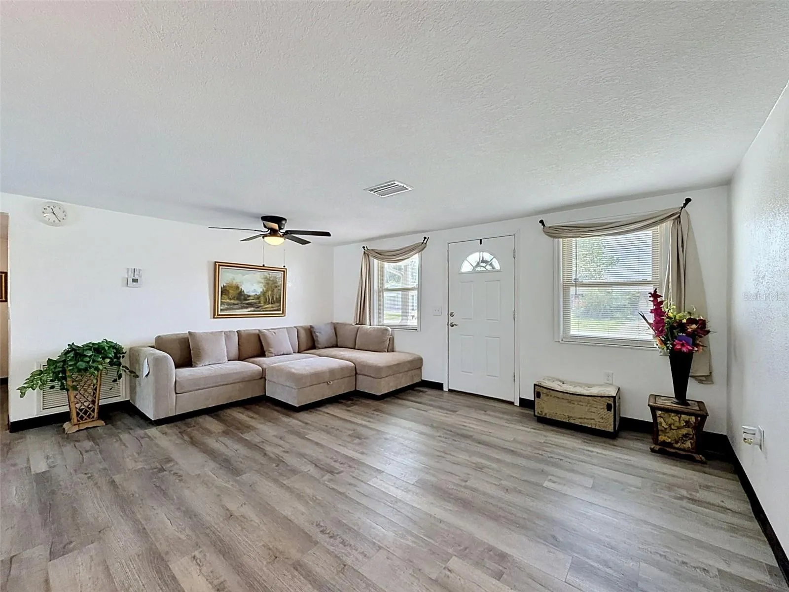 Freshly painted with luxury vinyl plank flooring.