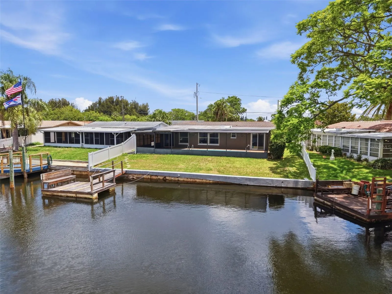 Expansive waterfront views highlight the coastal lifestyle.