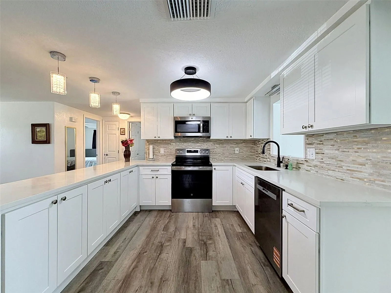 Stainless steel appliances and abundant prep space.