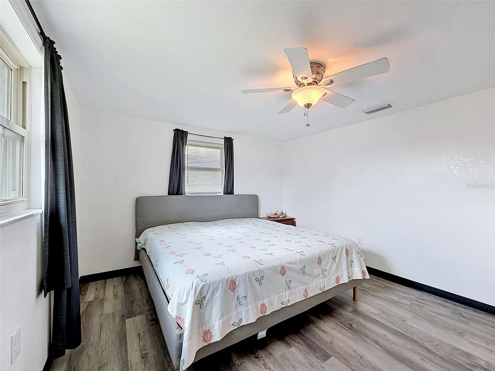 Large enough to comfortably accommodate a king-size bed.