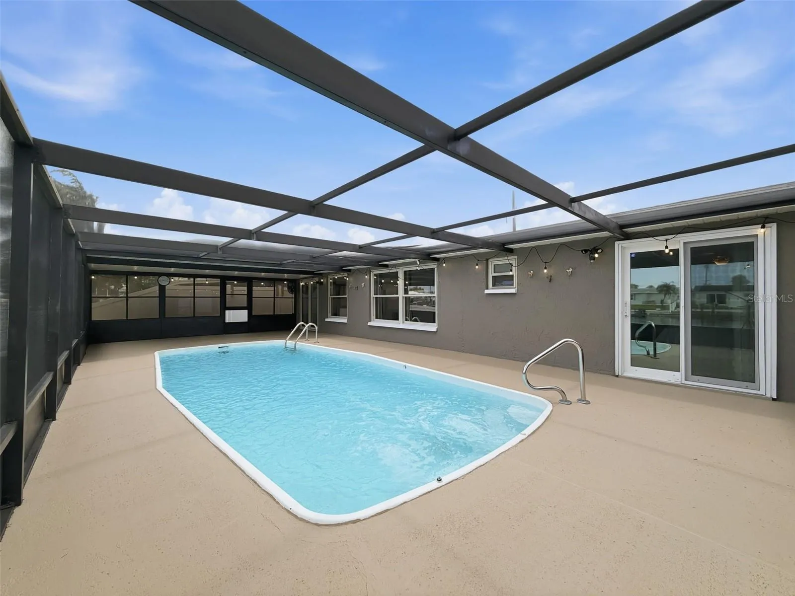 Enjoy waterfront breezes from the comfort of your screened lanai.