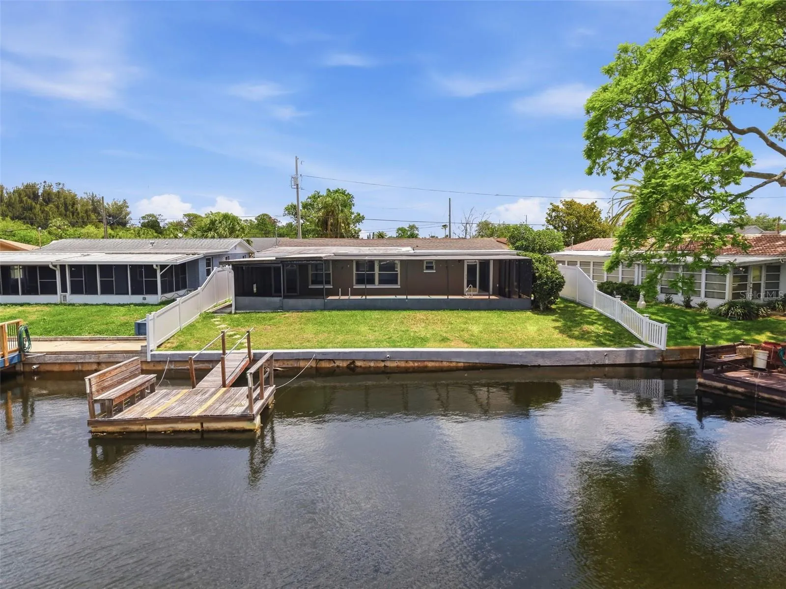 Bird’s-eye view captures the full beauty of this waterfront property.