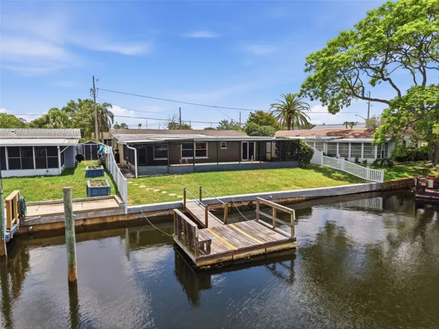 Aerial view of the floating dock and waterfront setting.
