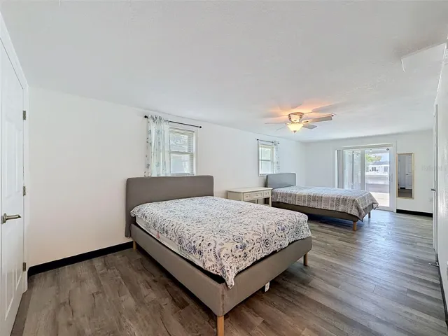 Spacious primary suite with room for multiple sleeping areas.