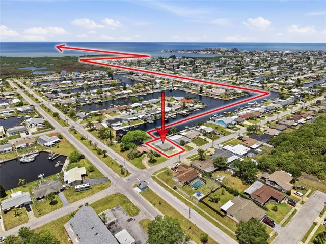 Aerial view highlights the direct Gulf access route from the property.
