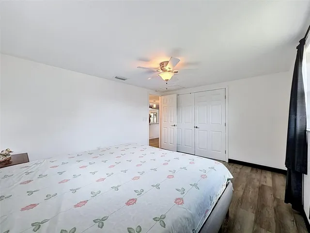 Bright and airy secondary bedroom with coastal feel.