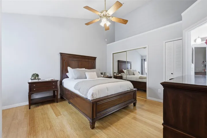 Primary bedroom with volume ceiling and ensuite bathroom