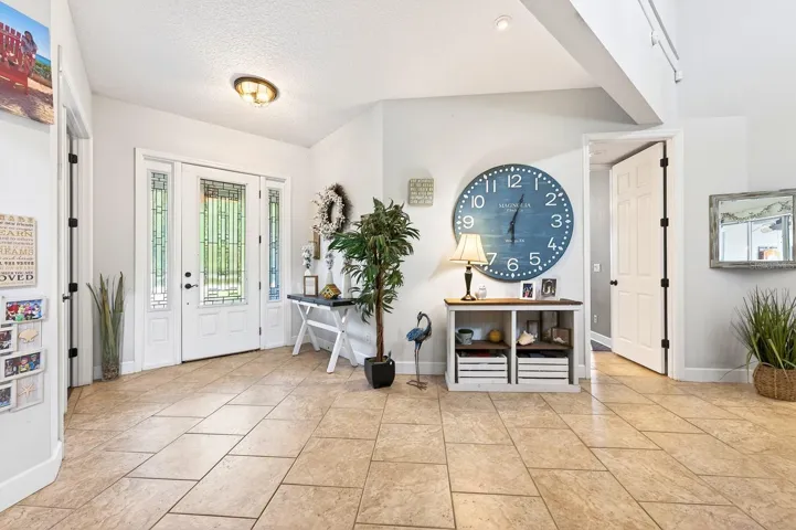 Light, bright, welcoming foyer.