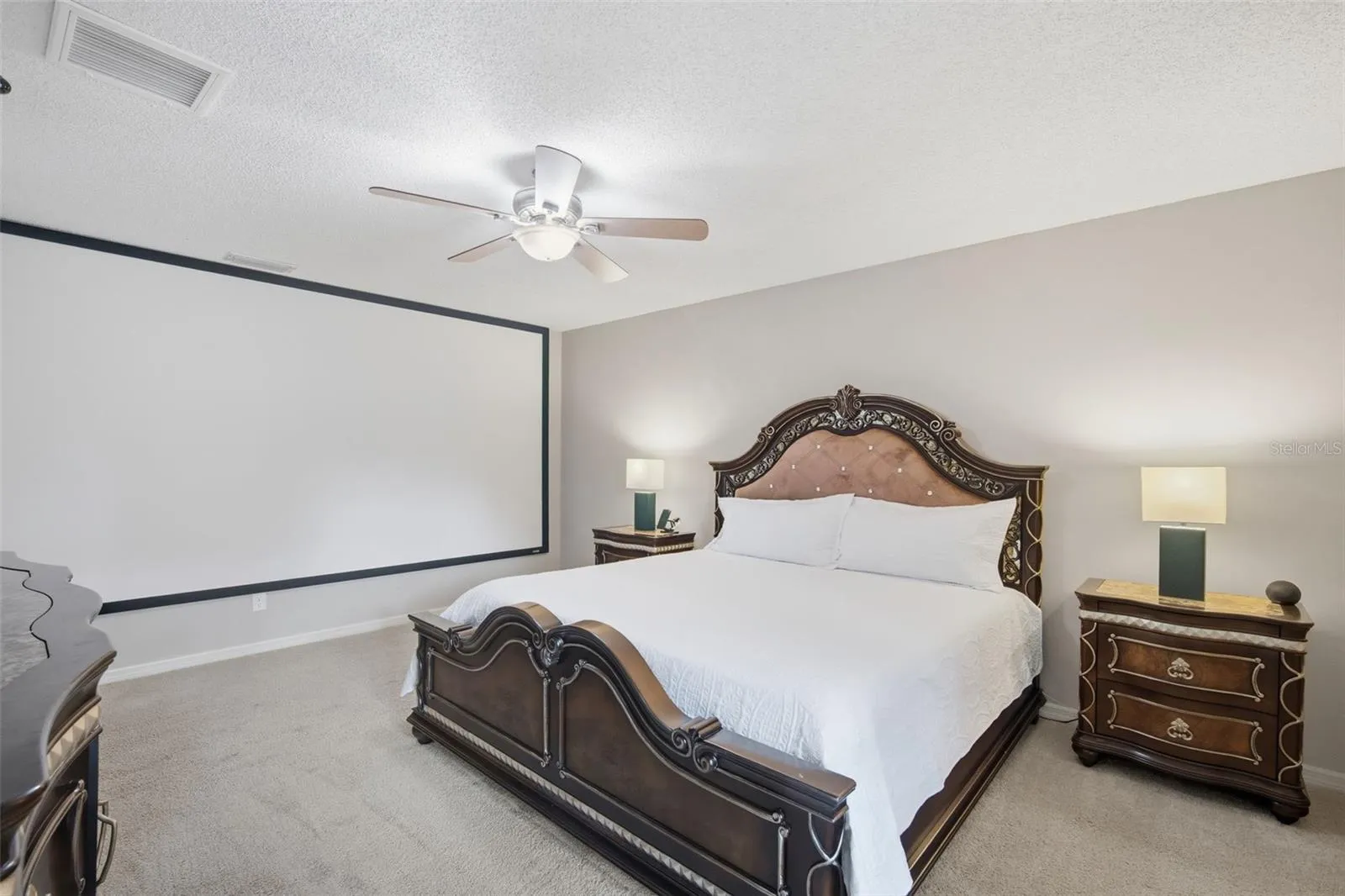 Primary Bedroom with FULL WALL movie screen