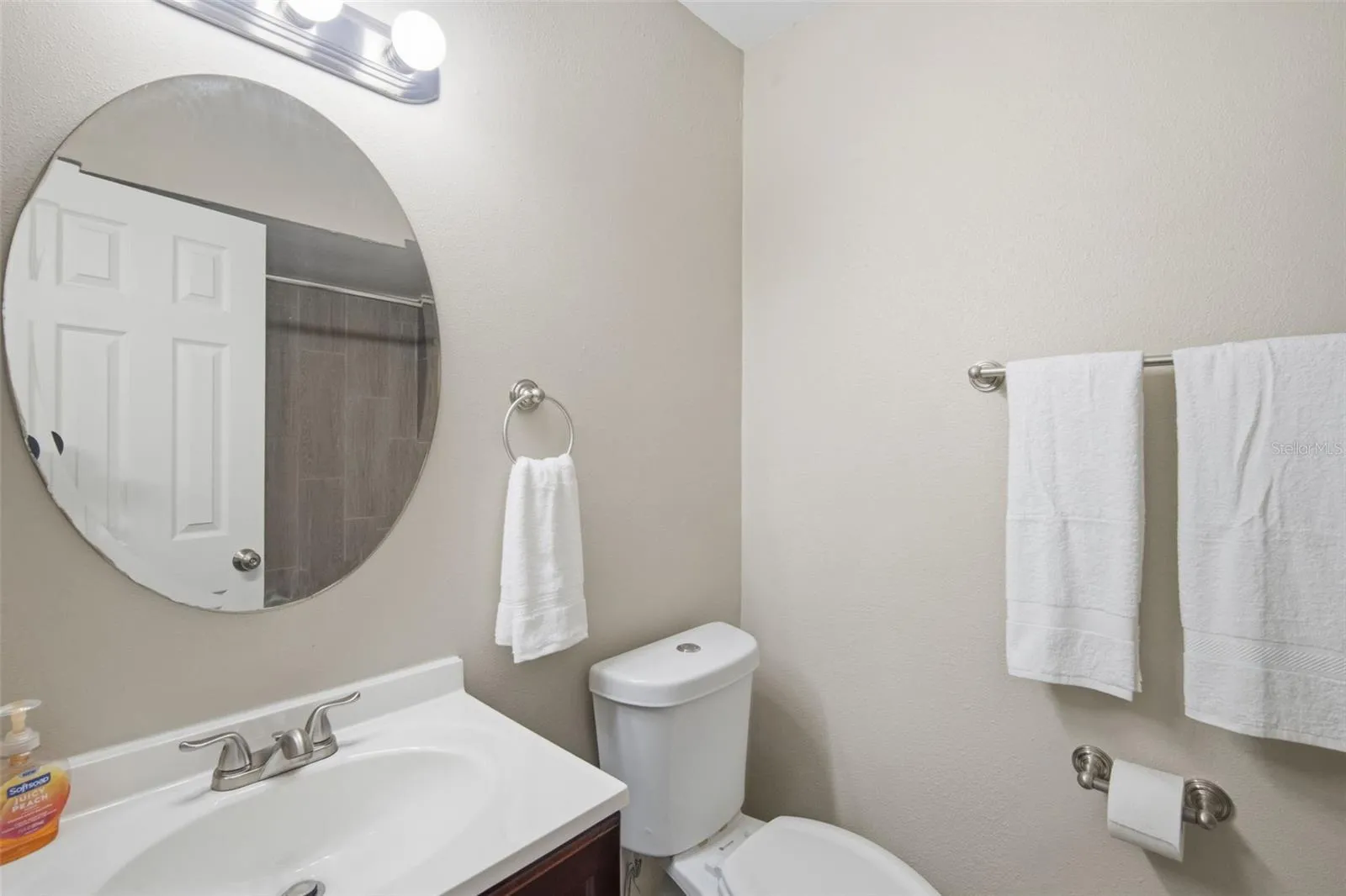 Primary Bathroom with Private sink, toilet, and tub/shower