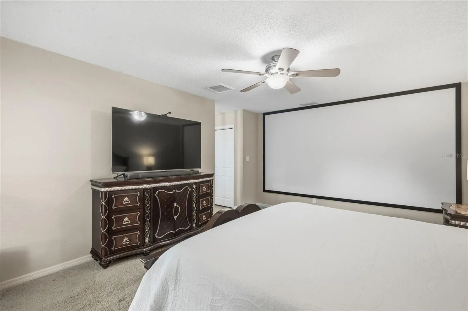 Primary Bedroom with FULL WALL movie screen