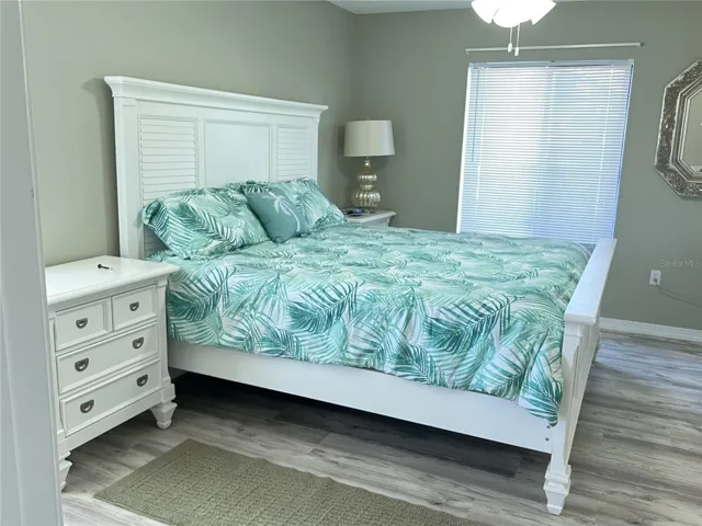 PRIMARY BEDROOM W/HAS BEAUTIFUL WHITE BEDROOM FURNITURE