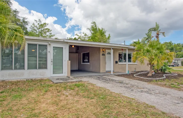 Private Driveway w/ Carport
