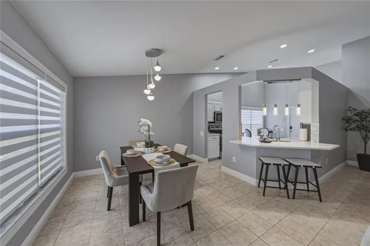 Dining Room with Vaulted Ceililngs