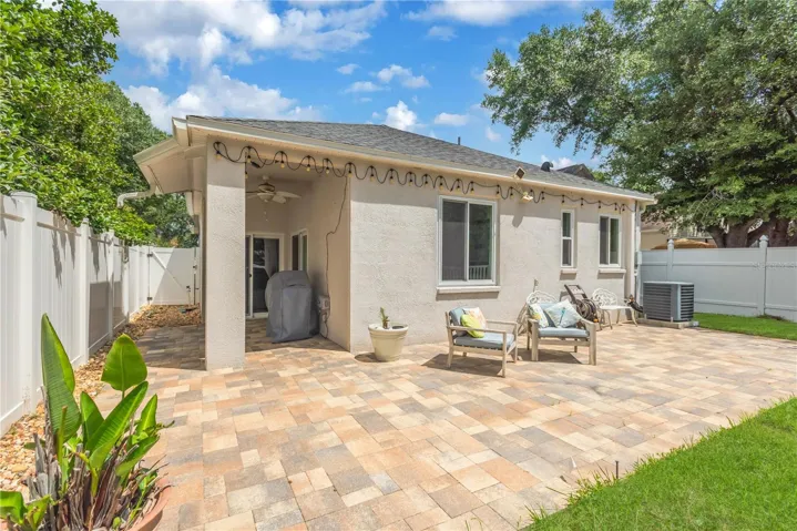 Open Patio - Lawn Digitally Enhanced in this photo