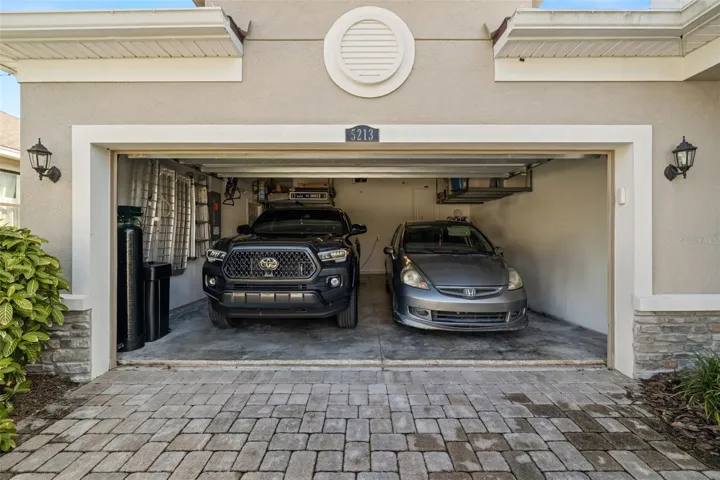 2 Car Garage with above head storage and air conditioned