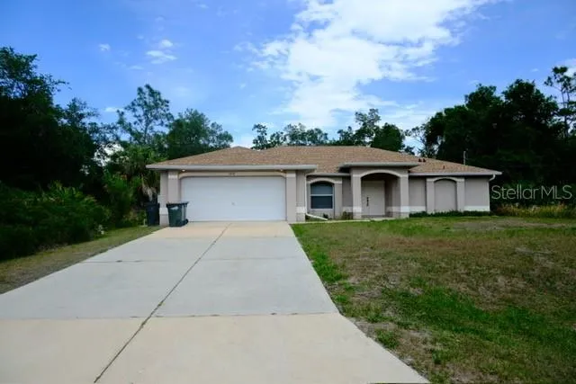 Surrounded by wooded lots on all sides