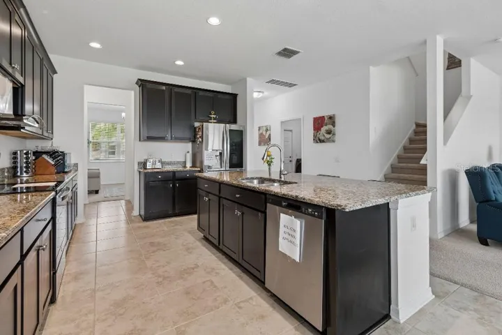 Comes with Brand New Appliances: Fridge, Range, Dishwasher & Microwave.