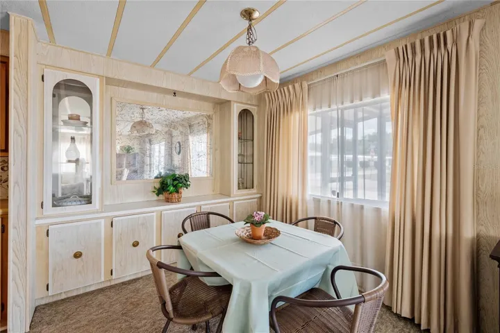 The dining room is just off the kitchen and has built ins