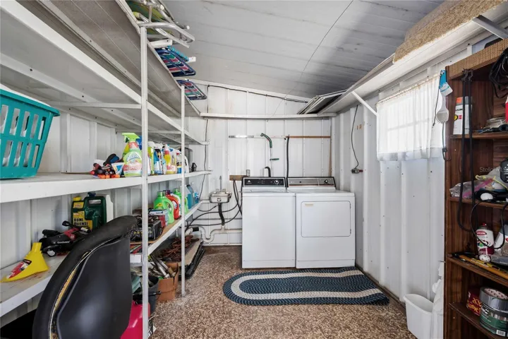 The laundry is just off the lanai and has plenty of storage.