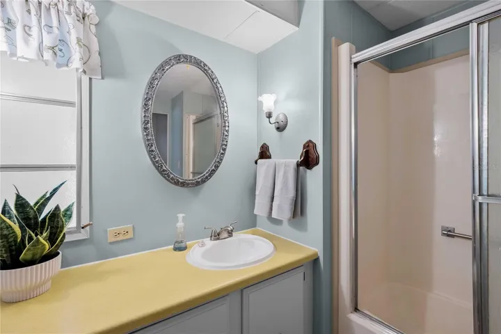 The ensuite primary bath has a walk in shower