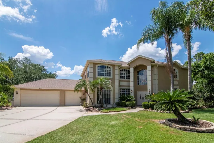 Front View with Extended Driveway