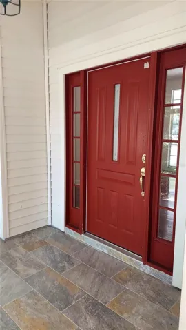 Front Door & tiled covered Porch