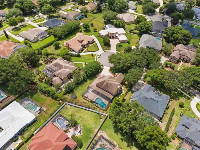 Aeriel view home on .49 acres