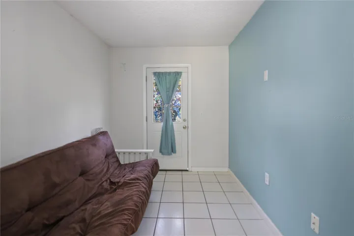 Mud Room with entrance from carport